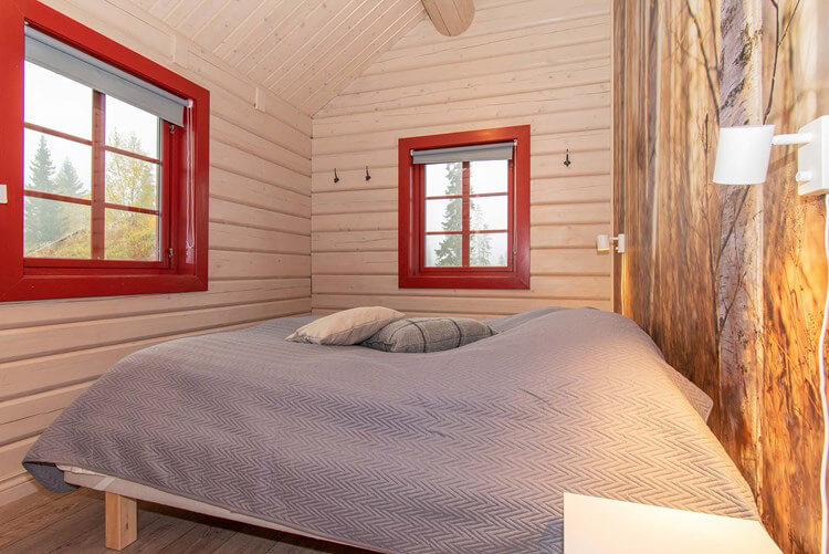Ein Schlafzimmer einer Ferienwohnung in Trysil