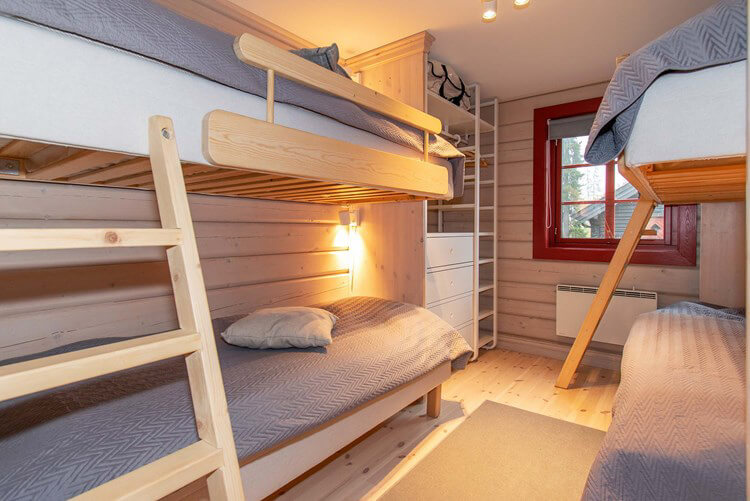 Ein Schlafzimmer einer Ferienwohnung in Trysil
