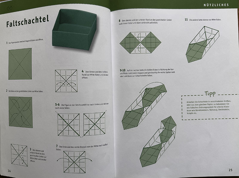 Seite aus einem Buch mit einer Anleitung zum Falten einer Schachtel.
